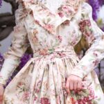 Rebecca Flint Instagram - There’s no greater thrill than wearing clothes you have sewn yourself 👗💃⁣ ⁣ A few weeks ago I decided to finally make use of an old pair of vintage floral curtains 🏡⁣ ⁣ Heavily inspired by 70s Prairie dresses, in particular, vintage Laura Ashley, this dress features a standing collar, lace detailed yoke with frill, leg-of-mutton sleeves with lace panels and pearl buttons, and a mighty skirt which holds more than 5 metres of length 😱⁣ ⁣ There’s still things I would try and improve on if I could sew it all over again, but I’m focussing on enjoying the fruits of my labour and the peace I had when sewing it 🧘‍♀️⁣ ⁣ If you sew too - tell me - do you always have the fear that for some reason it’s all going to fall apart as soon as you leave the house and be left bare? Tell me I am not alone! 🫢⁣ ⁣ Thank you to @hellomissjordan for a gorgeous day out, and for helping take these photos 🌸 Dalloway Terrace