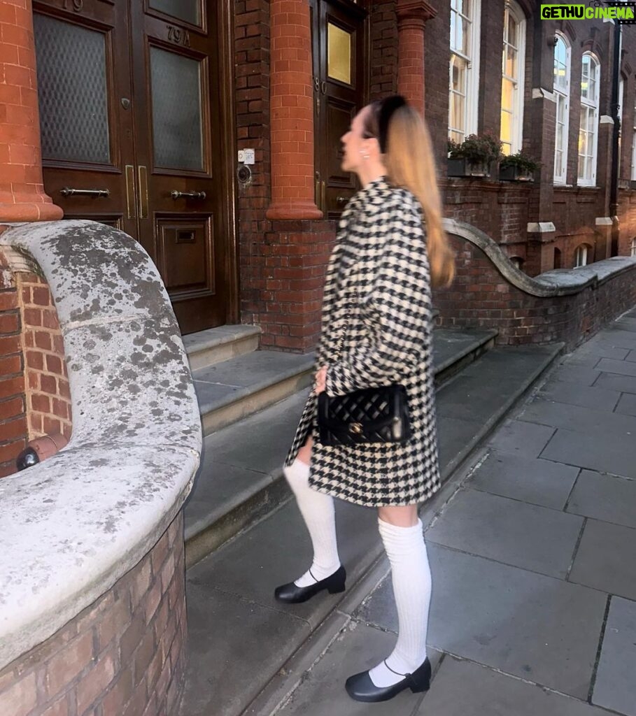 Rebecca Flint Instagram - but what are we wearing to the beatles concert at royal albert hall with live brass and strings 🗣️?? my fabulous coat is from @eyewoodwake vintage, the heat tech thermals are out in full force this chilly autumn from @uniqlo (an annual staple), I bought the velvet apron dress from japan maybe 7 years ago, the socks are also from Japan this summer, and my square toe maryjanes are @empressaustralia 🎀 Royal Albert Hall