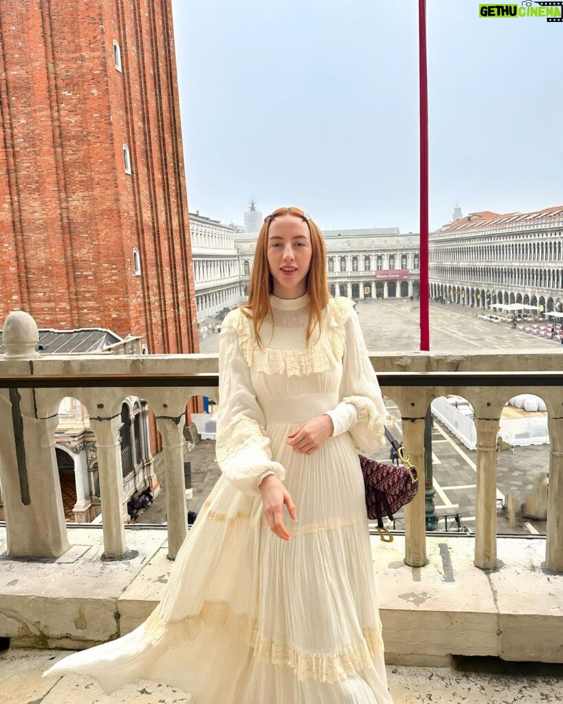 Rebecca Flint Instagram - photodump: Venice 🇮🇹 📍 1. A view from above St Mark’s Cathedral wearing my vintage gunne sax from @elindiovintage ✨ 2. Sun down the canals 3. over 8,000 square metres of mosaics at the cathedral 4. channeling dorothy wizard of oz, or wednesday addams, not sure 5. single file please 6. 1 tea and 1 hot choco price at Caffe Florian 😵‍💫 #vintageprairiedress #70sprairiedress #prairiedressobsessed #prairiedress #charityshopfashion #edwardianfashion #70sdress #softgirl #softgirlaesthetic #romanticstyle #canaletto #neobaroque #canalettoandvenice #canalettovenezia #baroquearchitecture #venicebiennale #18thcentury #historical #historylovers #neoclassicism #venicelife #venezia #veneziaunica #biennaledivenezia #historyofart #historyart #arthistorynerd #classicalpainting #arthistory #classicalart St. Mark's Cathedral