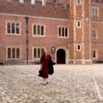 Rebecca Flint Instagram – if you can’t wear a cape in hampton court palace i’m not sure where you can 🌹?

I have always wanted to see this incredible tudor palace for myself and I was so excited to have the chance!

they had live cooking demonstrations inside the original kitchens, and we saw so many amazing tapestries and paintings… incredible day to visit!

the puff headband trend always reminds me of the French Hood so I had to wear this army green one, along with this spectacular velvet and silk cape picked up from @classiccarbootsale in the spring! My dress is vintage from Japan, and my bag is @aspinaloflondon. The shoes are @empressaustralia 🔍

Not forgetting my B necklace as an homage to Anne 🅱️❤️ Hampton Court Palace