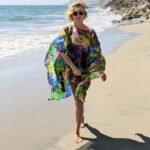 Rebecca Romijn Instagram - @luenell sent me this garment from her new line so I 90’s Supermodeled the shit out of it. Love you Lue.