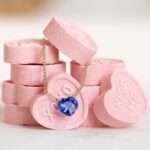 Rebecca Romijn Instagram – I am SO excited to announce a collaboration with one of my oldest and dearest friends since Berkeley high school @mayabrenner and my jewelry line @charliedollyjewelry! This limited-edition “Sweetheart” capsule features necklaces with a floating heart-shaped white, pink or blue sapphire on a delicate 14k gold chain. Just in time for Valentine’s day! — Now Available on Mayabrenner.com Swipe to sneak a peek!