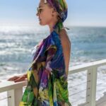 Rebecca Romijn Instagram - @luenell sent me this garment from her new line so I 90’s Supermodeled the shit out of it. Love you Lue.