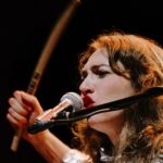 Regina Spektor Instagram - Hi friends! This is just to say that I hope you haven’t been too flooded and rained upon, that I am pondering a fun local to NYC announcement, and that if you haven’t yet signed up to my text list (USA only) or email list (world wide) then please do so… links to both in the Bio 🍂 We’ll be ready to send you the news soon ☎️✍️ Beautiful 📸 by @jennamurray from Central Park Summer Stage Silver 👗 by @batshevadress 🍂🍂🍂🍂🍂💕💕💕💕💕🎶🎶🎶