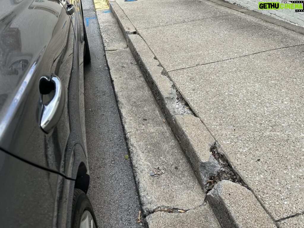 Rick Dees Instagram - Guess what is going to happen to my car door when I open it next to the sidewalk? Is there any reason to design a sidewalk like this?