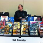 Rick Remender Instagram - A young man hawks his wares at a Seattle convention for the popular arts in 2012. He would eventually grow old and die.