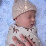 Riley Elliott Instagram - So we had a baby girl!!!! ✨ Sailor Jane Elliott ✨ Born 3rd October, 3.3kg. I’ve held baby sharks before, a few human ones here and there, but never have I experienced something quite like this. After an amazing labour by Amber, where she did 3/4 of the labour at home, we were surrounded by the most incredible team of women at North Shore Hospital. I was instructed by our midwife to catch my very own baby girl as she came into the world. From her very first moment in this world she was eyes open, super inquisitive and has been a dream so far, peacefully observing her new world with us. She’s already been in the water with Great Whites for Shark Week (inside mummy), has a wolf for a brother, and will likely live a very oceanic life. Lots of love little Sailor. And Amber, I am and always will be blown away by your strength and beauty xxx