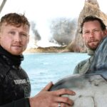 Riley Elliott Instagram - HAPPY @sharkweek Be sure to tune in on @discovery and online @discoveryplus Big thanks to @saminthewild_ for coming on a crazy sketchy weather burdened shark adventure chasing down Mako and Great white sharks. Climate induced weather systems made it deadly to get through the shoot but with persistence, an epic skipper Sean Kelly and an incredible crew of Sigmund Spath @wazzagreen Tony Spear @billy.turner98 @liquid_action_films George Hennah Camillo Spath and the epic team @radleystudios we managed to pull some rabbits from hats in front of active volcanoes and 100year storms. Insane voyage so be sure to check out Great White vs Mako Friday 29th in the Us And thank you so much to the Shark Week family from DC for the incredible annual goodie back of Shark Week memorabilia that I’ll still be rocking when I’m a 70year old salty dog.