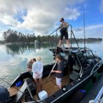 Riley Elliott Instagram - Thank you @sharkweek for another amazing opportunity to share sharks with the world. I hope you all enjoyed it!!! I’m sure there was something for everyone? I would love to know your thoughts? A huge thanks to all the crew who helped make Jaws in the Shallows. The NZ community who have helped fund tags, house our crew, feed us and provide super useful citizen science by reporting great white sightings. Thank you also to @stephendavidentertainment for helping produce our show. Thanks to @discovery for providing me a childhood dream come true. Thanks also to @extremeboats.nz @yamahamarinenz @gfabtrailers @raymarine_nz @mazda_nz for enabling this project with the research vessel and truck to tow it. Thanks to my stunning wife @amberandfriendsphoto for helping tag and present while in first trimester sickness xxx And thanks to awesome ocean hero’s @prideofgypsies @kimi_swimmy @mikecoots for bringing massive exposure and appreciation for the ocean. Jaws in the Shallows isn’t just a tv show, it’s a representation of a greater research project that I am writing up for publication now, in effort to bring better awareness of this endangered species. It’s also a project to help us as ocean users coexist while playing in the sharks domain. I surf in these very waters where there are now Great whites. Time to walk the talk aye;) Shark Week is about the sharks. Without such a platform, without public engagement and support, without brands supporting it, this wouldn’t happen so thank you all for helping us help the sharks.
