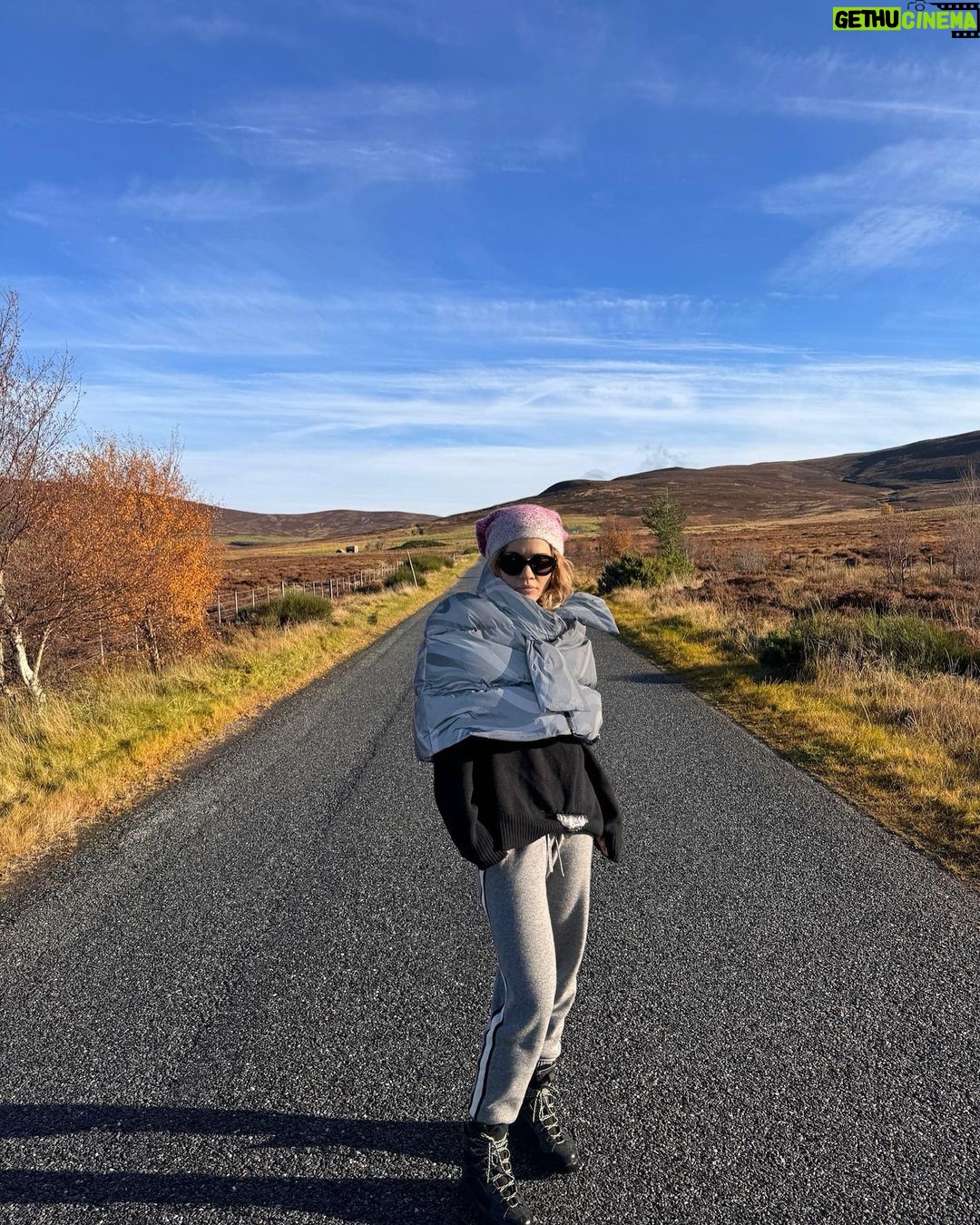 Rita Ora Instagram - I had THE MOST incredible time in Scotland!! Matched my outfit to the trees, obviously ππΌββοΈπ§‘β¨ I'll be back sooooon! We both loved exploring and living the Shrek fantasyβ€οΈ Feeling refreshed and recharged πββοΈππ
