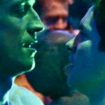 Robert Gant Instagram – Reflections from the dance floor as summer wanes. I was scrolling through some Queer as Folk Season 2 pics and spotted these from our QAF nightclub Babylon. (I do realize the green dance floor lighting makes us somewhat Incredible Hulk-like.) Felt like appropriate end of summer fare to share.

The dance floor and the club are long and enduring legacies of our journey as gay people. Going back to the secret, clandestine clubs where we were first able to meet and find each other. (The first gay bar I went to in my home town of Tampa was a cinderblock building that had no windows.)

The dance floor meant freedom and play and celebration while also being the source of some challenge. Connection and yet disconnection. The drinks and intoxicants, while a key part of our freedom and celebration, for some of us also became a crutch and, sometimes, an addiction. But that’s another (important) story.

Regardless, the dance floor will always be one of those places we can express our freedom, our celebration, and our love. As it was for Ben, Michael, and the gang. And, as in Babylon, the thumpa thumpa continues.

#QueerAsFolk #DanceFloor #Connection #Freedom #QAF #BestGayLife
