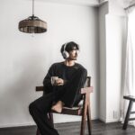 Robin Furuya Instagram - Coffee and chill music ☕️☕️ Remiのシルクのパンツが気持ちよすぎて毎日履いてる Glasses: @cal_o_line_official Top : @f_lagstuf_f Pants: @remi_relief_official Headphones: Sony WH-1000XM5 #古屋呂敏 Tokyo, Japan
