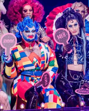 Roem Instagram - It's not a box... But HALELOO 🎁 I'm.. kinda back?

I had so much fun on set for drag race Holland season 2. It was an honour to be brought back to do what us queens do best: be judgemental. 

Actually.. i havent even watched the episode yet as I'm heading towards the season 2 première RIGHT NOW! So no spoilers (yes I know I win this time) 

Photography by the amazing @cyrieljacobs 
Outfit: @houseofnamaste & me
Hair: @flashwigz
Accesoires by: @tokyostoriescreations & me 

#dragraceholland
#rupaulsdragrace #punkmakeup #cyberpunkmakeup #cyberpunk #scifi #futuristic #wig #leather #bluemakeup #photography #dragracememes #dragrace #dragraceespaña #dragraceuk  #dragqueen #dragmakeup