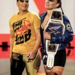 Ronda Rousey Instagram - This picture means so much to me, thank you @kimberlasskick 🙏🏼 @qosbaszler We waited. We manifested. We worked for YEARS to be able to walk to that ring and fight together. The playing field will never be level again.