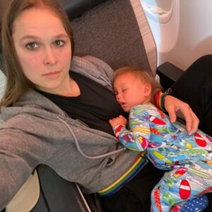 Ronda Jean Rousey Instagram - Poor girl had a few rough travel days, she’s such a road warrior✈️❤️ Can’t believe she’s already 1 and getting too big to sleep in my lap 😭