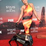 Ronda Rousey Instagram - #StarsOnMars premier event yesterday - Honestly was ecstatic to see some of my fellow martians again 😭 We cleanup alright after chaos (example of chaos in last pic with @natashaleggero) Don’t miss the first episode of #StarsOnMars June 5th on @realityclubfox (next day on @hulu ) 👗 @alejandrovision 💇🏼‍♀️ @thisisbabe 💄 @heeezooo