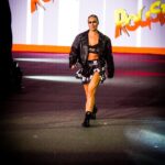 Ronda Rousey Instagram - Thanks for the photos, warpaint, braids, shoes, jacket, kilt, gear, everything 🙏🏼 📸 @kimberlasskick @dtfmania 💄 @mariko_hirano 💇🏼‍♀️ @thisisbabe 🥾 @mizunousa 🥊 @nazoboxing 🧥 @langlitzleathers 🩲 @iammikaze 👗 @alejandrocollection