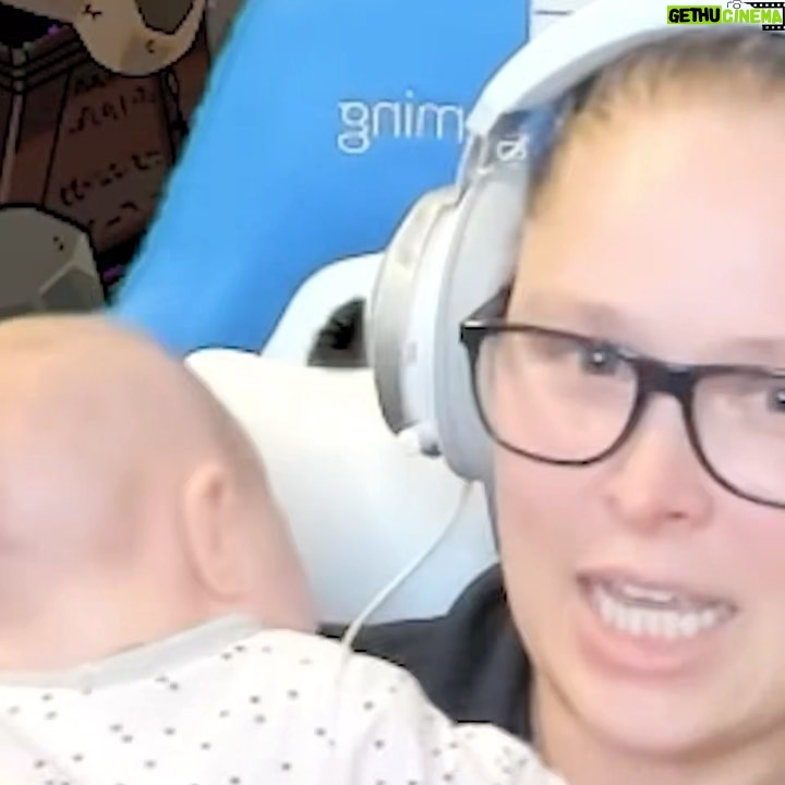 Ronda Rousey Instagram - Here it Is!!! The much demanded and awaited capture of the #BaddestStream hit single “It’s a Good Time to be Pō” composed and performed by myself while playing #Hades on @facebookgaming for baby Pō while she was getting cranky waiting for the slowest bottle warmer on earth to warm up her milk. Spoiler, I escaped Hades, Pō got her bottle and took a nap. Keep an eye out for when we announce when we go live on our next stream on @facebookgaming !!