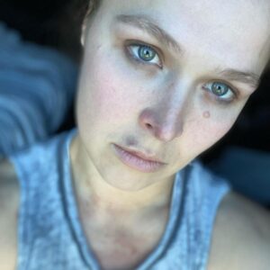 Ronda Jean Rousey Instagram - I honestly don’t mind getting scuffed up doing cool stuff, I like feeling that earned soreness - and this lip bruise is almost like a reverse lip liner, I think it’s kinda cute. 

The last 6 months the road to #wrestlemania38 has been arduous in ways no one could know without experiencing.
I’m gunna allow myself to feel proud of my work yesterday, go take a bath, cuddle with my husband and baby, pet some cows, play some #horizonforbiddenwest - and get ready for round 2 
see you guys on Friday 😉
