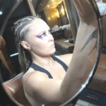 Ronda Rousey Instagram - Thanks for the photos, warpaint, braids, shoes, jacket, kilt, gear, everything 🙏🏼 📸 @kimberlasskick @dtfmania 💄 @mariko_hirano 💇🏼‍♀️ @thisisbabe 🥾 @mizunousa 🥊 @nazoboxing 🧥 @langlitzleathers 🩲 @iammikaze 👗 @alejandrocollection
