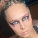 Ronda Rousey Instagram - Thanks for the photos, warpaint, braids, shoes, jacket, kilt, gear, everything 🙏🏼 📸 @kimberlasskick @dtfmania 💄 @mariko_hirano 💇🏼‍♀️ @thisisbabe 🥾 @mizunousa 🥊 @nazoboxing 🧥 @langlitzleathers 🩲 @iammikaze 👗 @alejandrocollection