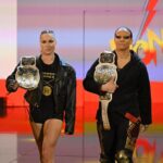 Ronda Rousey Instagram – Damn we look good in gold @qosbaszler 🥇🥇
And my hair is a special kind of fantastic while cranking on @katana_wwe’s arm 💇🏼‍♀️thank you @thisisbabe ! #TagTeamChamps #AndStill
