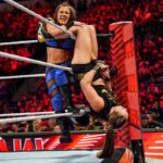 Ronda Rousey Instagram – Damn we look good in gold @qosbaszler 🥇🥇
And my hair is a special kind of fantastic while cranking on @katana_wwe’s arm 💇🏼‍♀️thank you @thisisbabe ! #TagTeamChamps #AndStill