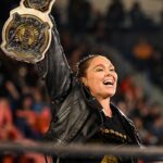 Ronda Rousey Instagram – Damn we look good in gold @qosbaszler 🥇🥇
And my hair is a special kind of fantastic while cranking on @katana_wwe’s arm 💇🏼‍♀️thank you @thisisbabe ! #TagTeamChamps #AndStill