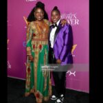 Rutina Wesley Instagram - Seeing old friends, meeting new friends…joy was in the “Heir”. 💜💜💜 Thank you mama @koshiemills and @heirsofafrika for having me. Makeup: @savvystarbeauty Hair: @tallulahm Suit/Accessories: @albalegacy Sneaks: Dunk Supremes 📸 @gettyimages