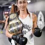 Sabina Mazo Instagram - Our newest @lfafighting champion just got home with her belt and is already back in training. We have more camps and more victories to get after, and she’s not the kind of girl to sit out when there is work to be done. There’s no one who deserves this belt more than @sabinamazo Congratulations champ. 📸: @emilsmarie ______________________________ Nossa mais nova campeã @Ifafighting acabou de chegar em casa com seu cinturão e já está de volta aos treinos. Temos mais acampamentos e vitórias para buscar, e ela não é o tipo de garota que fica de fora quando há trabalho a ser feito. Não existe ninguém que mereça mais esse cinturão do que @sabinamazo. Parabéns, campeã. ‌ #BlackHouseMMA #LFAfighting #LFAchampion #flyweightchamption #womensflyweight #125champion #worldchampion #championshipbelt #fightlikeagirl #womenwhofight #girlfighter #muaythai #boxing #combatsports #mma #mmagym #wrestling Black House MMA