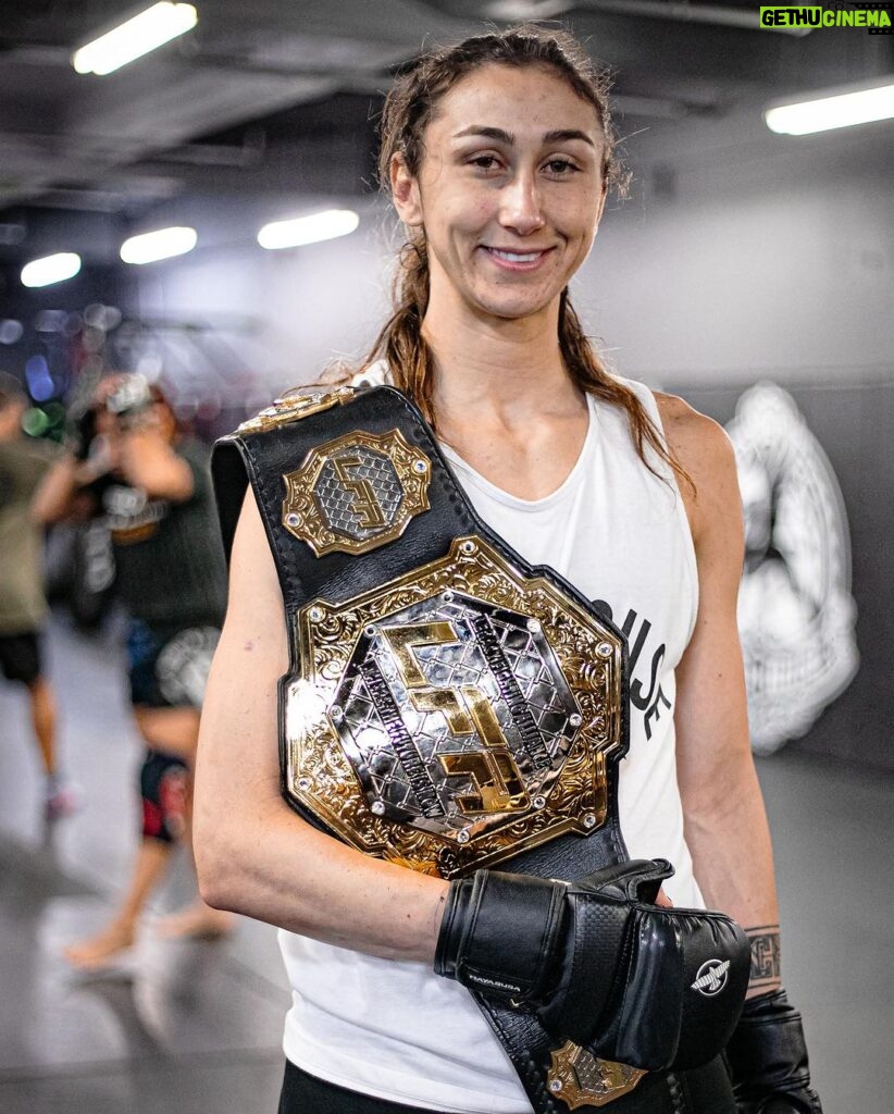 Sabina Mazo Instagram - Our newest @lfafighting champion just got home with her belt and is already back in training. We have more camps and more victories to get after, and she’s not the kind of girl to sit out when there is work to be done. There’s no one who deserves this belt more than @sabinamazo Congratulations champ. 📸: @emilsmarie ______________________________ Nossa mais nova campeã @Ifafighting acabou de chegar em casa com seu cinturão e já está de volta aos treinos. Temos mais acampamentos e vitórias para buscar, e ela não é o tipo de garota que fica de fora quando há trabalho a ser feito. Não existe ninguém que mereça mais esse cinturão do que @sabinamazo. Parabéns, campeã. ‌ #BlackHouseMMA #LFAfighting #LFAchampion #flyweightchamption #womensflyweight #125champion #worldchampion #championshipbelt #fightlikeagirl #womenwhofight #girlfighter #muaythai #boxing #combatsports #mma #mmagym #wrestling Black House MMA