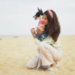 Sahana Sarvesh Instagram - #sirukoodu ♥️ Happy place :) Nisha, a very puny, weak, traumatised one month old pup showed up at our doorstep on Diwali in 2021. After being constantly attacked by multiple dogs and crackers, she was terrified to even lift her head up for about six months. It’s been 2 years now and she’s super happy and naughty at home but, the moment we take her out, her trauma rolls in and she’s constantly terrified. This was her second visit to the beach and she’s doing SO much better now :)))) Being around my babies is the happiest i can ever be, my happy place :) #adoptdontshop @sonymusic_south @darbukasiva @the.meethling @being.productions @asalkolaar Shot by @frames_arw Edit @cutscoffeestudio #dogsofinstagram #doglover #adoptdontshop #sirukoodu #sonymusic #sonymusicindia #dog #chennai #beach #puppylove #puppylife #animalsoverpeople