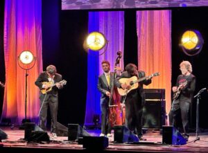 Sam Bush Instagram - The 2023 @intlbluegrass Awards was a night to remember! Congratulations to all winners and nominees, and a special congratulations to Sam for his induction into the Bluegrass Music Hall of Fame - a testament to his outstanding contributions to the genre and commitment to his craft! Cheers, too, to Sam, @jonweisberger and @smithsonianfolkways for winning the Industry Liner Notes of the Year for Radio John: The Songs of John Hartford! 

#sambush #bluegrassmusichalloffame #newgrass #IBMA #IBMAAwards

Photos by Rob Laughter and Tom Beck