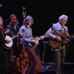 Sam Bush Instagram - @stubobduncan, Jim Mills, @alanbartrambass, Sam and @delmccouryband and many more spent this past Saturday night celebrating Earl Scruggs' 100th heavenly birthday at @theryman in Nashville! The evening was filled with memories of Earl's career and highlighted his profound impact on the music industry. The show benefitted the @earlscruggscenter in Shelby, North Carolina. Another Nashville moment Photo by Eric Ahlgrim / Courtesy of the Ryman Auditorium #sambush #earlscruggs #rymanauditorium #nashville #tennessee #bluegrass #newgrass