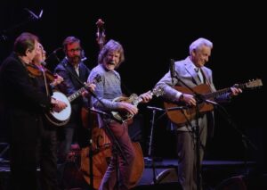 Sam Bush Instagram - @stubobduncan, Jim Mills, @alanbartrambass, Sam and @delmccouryband and many more spent this past Saturday night celebrating Earl Scruggs' 100th heavenly birthday at @theryman in Nashville! The evening was filled with memories of Earl's career and highlighted his profound impact on the music industry. The show benefitted the @earlscruggscenter in Shelby, North Carolina. Another Nashville moment 

Photo by Eric Ahlgrim / Courtesy of the Ryman Auditorium

#sambush #earlscruggs #rymanauditorium #nashville #tennessee #bluegrass #newgrass