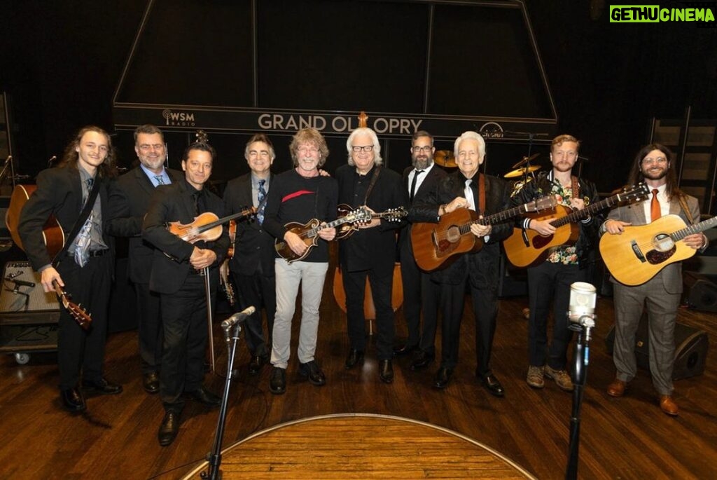 Sam Bush Instagram - What a joy to celebrate Del McCoury (@delmccouryband) for his 20th anniversary as a member of the @opry. We had friends and family and Music Lovers from everywhere in attendance. Read all about it and enjoy some pictures of the event as published by our friends at @bgtoday: https://bluegrasstoday.com/photos-from-grand-del-opry-2/ #sambush #grandoleopry #granddelopry2 #delmccoury #tylerchilders #rickyskaggs #newgrass #bluegrass