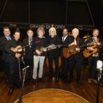 Sam Bush Instagram - What a joy to celebrate Del McCoury (@delmccouryband) for his 20th anniversary as a member of the @opry. We had friends and family and Music Lovers from everywhere in attendance. Read all about it and enjoy some pictures of the event as published by our friends at @bgtoday: https://bluegrasstoday.com/photos-from-grand-del-opry-2/ #sambush #grandoleopry #granddelopry2 #delmccoury #tylerchilders #rickyskaggs #newgrass #bluegrass