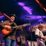 Sam Bush Instagram - How we LOVE @merlefest! Sam and band are returning next year too! Join us in Wilkesboro, NC in April, 2024! Tickets are on sale now: https://merlefest.org/purchase/ #sambush #sambushband #newgrass #bluegrass #merlefest #wilkesboro #northcarolina Photos by: @heidih.music