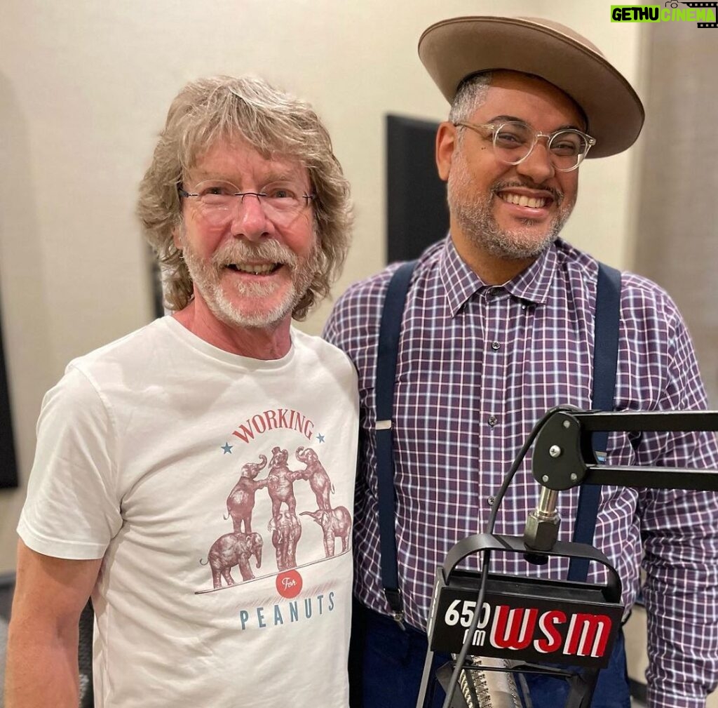 Sam Bush Instagram - Sam recently paid a visit to the great @domflemons in Nashville to record an episode of Dom’s American Songster Radio Show (@wsmradio)! They talk about Sam's experience learning how to play fiddle, being part of the bluegrass community, and his new album “RADIO JOHN: THE SONGS OF JOHN HARTFORD.” Enjoy a quick jam session too. Listen to the episode here: https://wsmradio.com/shows/american-songster-radio/ #sambush #donflemons #americansongsterradioshow #newgrass #bluegrass