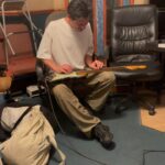 Sam Palladio Instagram - Cooking up some tunes in London with @connors_danny & @andyhallhall. Using an AA battery as a slide guitar Battersea Power Station