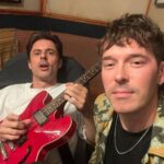Sam Palladio Instagram - Cooking up some tunes in London with @connors_danny & @andyhallhall. Using an AA battery as a slide guitar Battersea Power Station