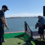 Samm Levine Instagram - When @topgolf invites you to hit balls off the USS Midway into San Diego Bay, you say yes. Even if you aren’t a golfer. And I am not a golfer. #BeginnersLuck #TopGolf #SDCC
