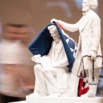 Sanford Biggers Instagram - ‘Lifting The Veil’ (2023) White Carrara marble, antique quilt H: 45.5 in x W: 30.38 in x D: 28.95 📸 3: ‘Booker T. Washington Lifting The Veil of Ignorance’ Inscription: “He lifted the veil of ignorance from his people and pointed the way to progress through education and industry.” #studiosanfordbiggers #remancipationproject #history #frederickdouglass #abrahamlincoln #bookertwashington Chazen Museum of Art