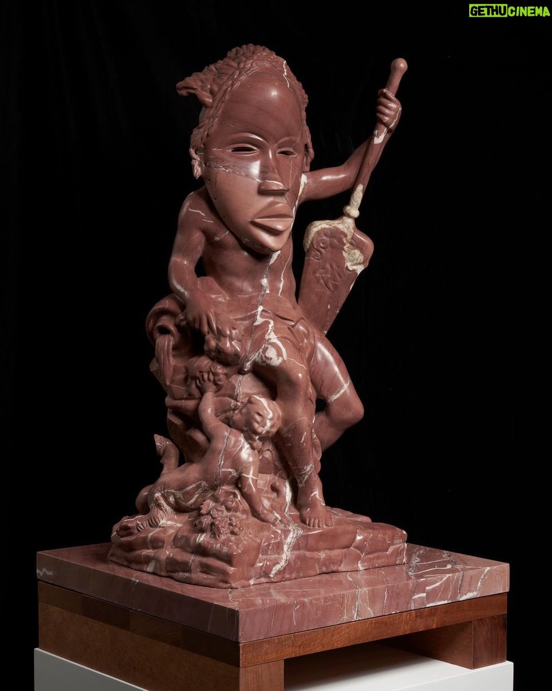 Sanford Biggers Instagram - 👁 Nile, 2022 featured in ‘The Extinction Agenda’ @massimodecarlogallery (closed on 6/4/22) The body is based off of a French sculpture from the 1800s that was called La Seine. The figure is based off of a river god. And the river god is an archetype that you see in a lot of Greco-Roman history as well as other cultures, representing, you know, the force and strength and power and mystery of rivers. And I've been fascinated with that motif so some of those figures are in this particular show. I was playing with the names and of course La Seine represents the river in France and in this case, I renamed it Nile because of the presence of another hybridized African mask that's on top of the figure. Nile is made out of 'Rosso Cardinale' marble, and one of the things that really draws me to it is the very beautiful hue, that sort of reddish pinkish clayish type of colour and the very distinctive veining that goes through it almost like a river itself. #hybrid #history #sculptureart #studiosanfordbiggers #marble Massimo De Carlo, Hong Kong