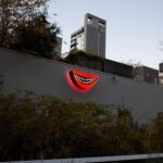 Sanford Biggers Instagram - Cheshire (Janus) (2023) is currently on view from the High Line- between the 23rd and 26th street entrances 🙏🏿 “This wide grin—a Cheshire Cat smile-is a frequent motif in Biggers’s oeurve. Employed throughout his work in sculpture, his video practice, and in his quilt-based Codex works-and presented at varying levels of legibility— the work makes reference to Lewis Carroll’s Cheshire cat as well as the racist caricatures of 19th-century minstrel shows. Biggers complicates and questions these signifiers, ultimately offering new understandings of collective mythologies and traditions.” - @marianneboeskygallery Cheshire (Janus), 2023. Unique within a series. Aluminum, plexiglass, LEDs, timer. 30 1/2 × 51 1/4 x 12 3/4 inches, 77.5 x 155.6 x 32.4 #studiosanfordbiggers #janus #cheshirecat #coded #history Highline