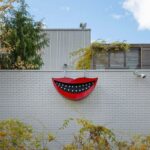 Sanford Biggers Instagram - Cheshire (Janus) (2023) is currently on view from the High Line- between the 23rd and 26th street entrances 🙏🏿 “This wide grin—a Cheshire Cat smile-is a frequent motif in Biggers’s oeurve. Employed throughout his work in sculpture, his video practice, and in his quilt-based Codex works-and presented at varying levels of legibility— the work makes reference to Lewis Carroll’s Cheshire cat as well as the racist caricatures of 19th-century minstrel shows. Biggers complicates and questions these signifiers, ultimately offering new understandings of collective mythologies and traditions.” - @marianneboeskygallery Cheshire (Janus), 2023. Unique within a series. Aluminum, plexiglass, LEDs, timer. 30 1/2 × 51 1/4 x 12 3/4 inches, 77.5 x 155.6 x 32.4 #studiosanfordbiggers #janus #cheshirecat #coded #history Highline