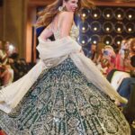 Sangita Patel Instagram - That’s ME! On the catwalk, representing 💪🏽 When @vickymilner6 asked me to walk the runway in an Asian design I couldn’t have been more proud. Full circle with @lotusbloomofficial who dressed my girls for wedding season, how this relationship has flourished! So proud and happy for you. Now, This DRESS, insane and heavy! Funny story - the dress was so heavy I had a a beautiful male model help me down the stairs and then the MUSIC, got me pumped so you know me…I danced (swipe left) thanks @amandabrugel 💃🏽 Thank you to all those who came out to support lil ole me, meant so much😊 #MomentsIWillCherish #CanadianFashion @fairmontroyalyork 🥰 Fairmont Royal York