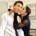 Sangita Patel Instagram - This photo was taken an hour before I said YES 💍 I just got my Engineering degree the day before and then Sam whisked me away to Bahamas. Little did I know he had already met with my family and asked for their blessing 🥰 (my sisters kept a secret from me, how dare they 😂) Sam got on one knee (same height as me when he kneels😊) I was complaining about the bugs on the beach and missed the whole ‘will you marry me’ I’m pretty sure I said Holy 💩 20 YEARS! The moments, the memories, the ride….what 👏🏽 an 👏🏽 incredible 👏🏽 ride! I think the best way to explain the carousel is K-I-S-S-I-N-G nursery rhyme, remember?! First come love ❤️ then comes marriage 💍 Then came Ava and Shyla in a baby carriage 🍼 Oh and Indie 🐶 Happy 20th Anniversary Sam (still checking you out, hubba hubba 😉❤️ #20thWeddingAnniversary #Myjoy #Mylife #laughter