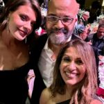 Sangita Patel Instagram – O-M-G It’s LENNY! Mr. rockstar Kravtiz 🔥 
Dude is ✌🏽 signing and there’s Morgan and I and others in the pic, epic! 
This trip was like:
Sangita: Hey Morgan wanna be my date, Morgan: Sure, for what? 
Sangita: The CCA awards….(pause) but in LA? 
Morgan: Sure
Sangita: booking tickets, it will take 8 hrs to get there
Morgan: Sure
Sangita: Let’s the adventure begin! Can we get shake shack?😂
Morgan: Sure 🥰
Luv ya @morganhoff going with the flow! 

The night was inspirational to see incredible talent, including Jamie Fox

And YES Lenny smells great 😂

#OneNightInLA #EpicNight #SanAndMorAdventures Los Angeles, California