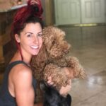 Santana Garrett Instagram - I WOOF you guys. 💙✨🐶 (Swipe to the last photo) 😂 #nationaldogday #dog #dogs #internationaldogday #daschund #goldendoodle Orlando, Florida